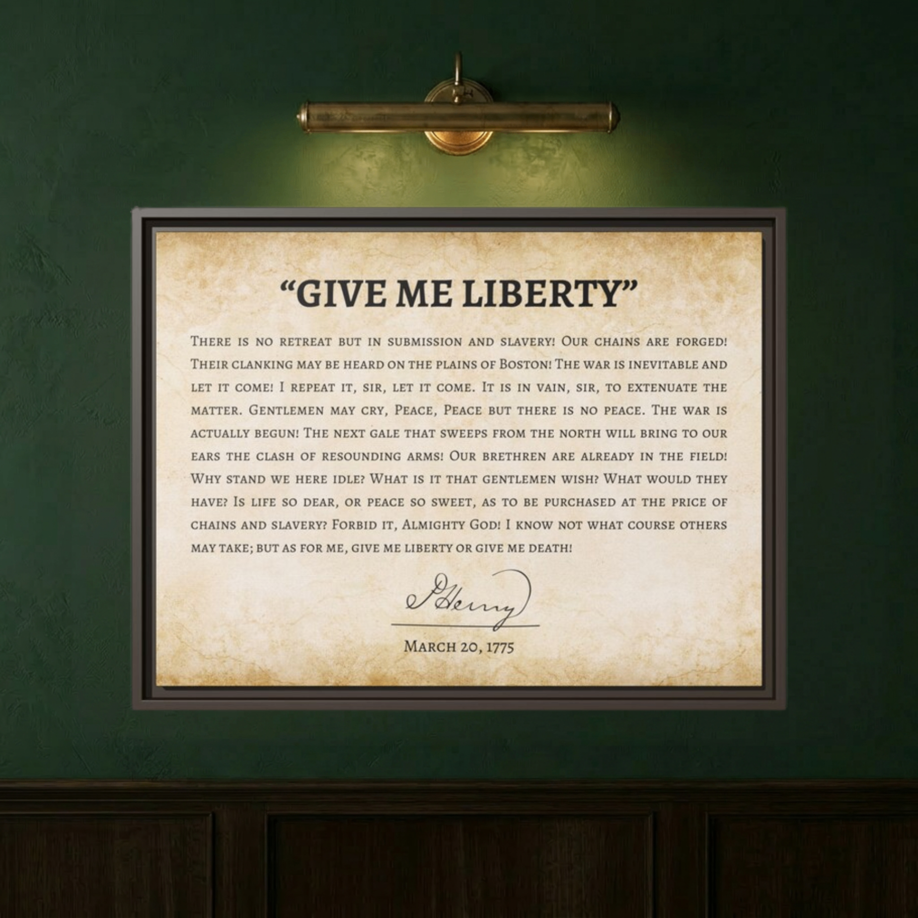 Close-up of the Give Me Liberty speech framed canvas on a dark wall lit by a brass picture light